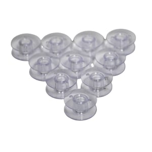 May include: A collection of clear plastic sewing machine bobbins arranged in a triangular shape. The bobbins are transparent, showing their internal structure. They are designed to hold thread for sewing projects.