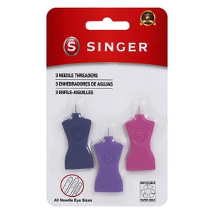 May include: A package of Singer needle threaders. The package is red and white, with the Singer logo at the top. Three needle threaders in blue, purple, and pink are visible. The text "3 Needle Threaders" is printed on the package.