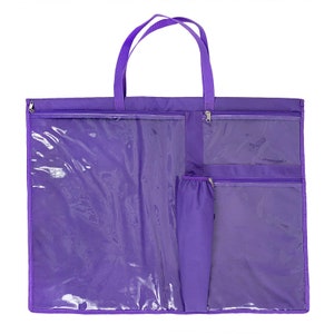 May include: Purple tote bag with multiple clear plastic pockets and a zippered pouch. The bag has two handles.