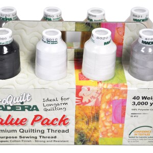 May include: A value pack of six spools of Madeira AeroQuilt thread. The spools are in a cardboard box with a colorful design. The thread is 40 weight and 3,000 yards long. The thread is 100% polyester core spun. The box says "Ideal for Longarm Quilting".