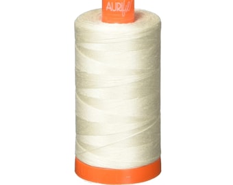 May include: A spool of cream-colored thread with an orange label that says "Aurifil" on it.