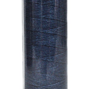 May include: A spool of dark blue thread labeled "DENIM DOC Art. 3623 100m/109yds col. 3623"