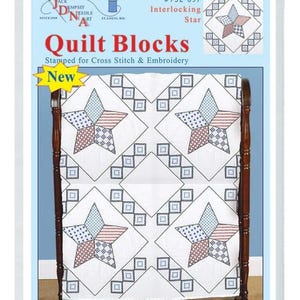 May include: A package of quilt blocks for cross stitch and embroidery. The blocks feature a star design with red, white, and blue patterns. The package includes six 18" x 18" blocks of cotton/poly broadcloth.