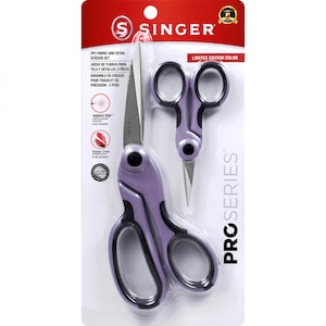 May include: A set of two Singer Pro Series scissors with purple handles and black accents. The larger scissors have a Nano Tip and the smaller scissors are for detail work. The packaging says "Limited Edition Color".