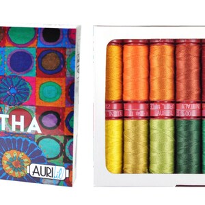 May include: A box of 20 spools of Aurifil thread in a variety of colors, labeled "Glorious Kantha" for big stitch hand quilting and embroidery by Kaffe Fassett & Liza Lucy.