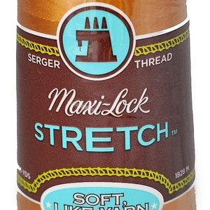Peut inclure: Une bobine de fil Maxi-Lock Stretch de couleur or pour surjeteuses. L'étiquette indique "Soft, Like Yarn" et "Textured Nylon".