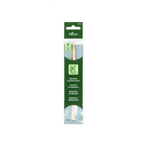 May include: A green and white package containing a 5.0 mm bamboo crochet hook. The package is labeled "Clover Takumi Bamboo Crochet Hook" and includes instructions in English, French, Spanish, and German.