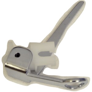 May include: A silver sewing machine foot with a white plastic piece attached to it. The foot has a small hole in the center and a curved handle.