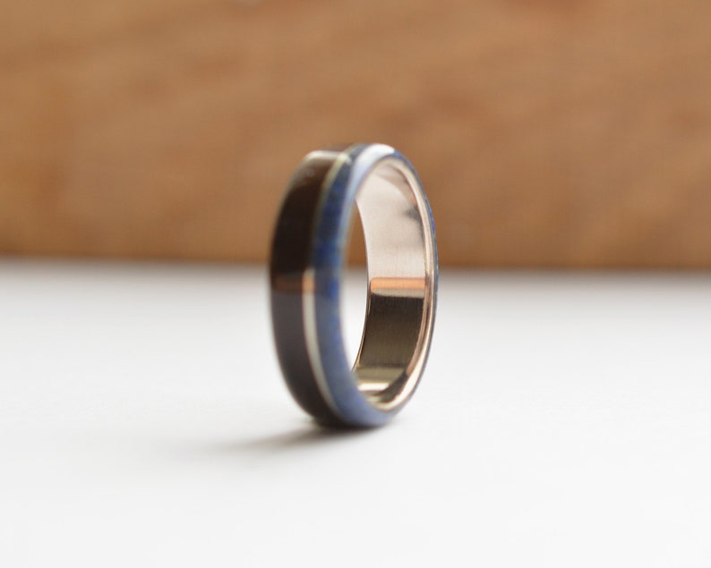 Handmade bog oak wood ring with stainless steel and crushed lapis lazuli inlays on sterling silver core Perfect wood wedding band