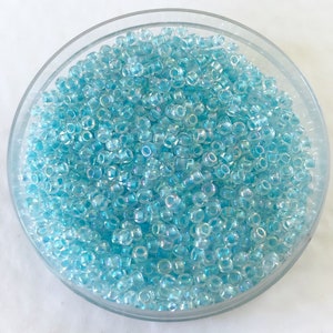 Perline di semi del tesoro TOHO Rainbow Aqua 11/0, Frost trasparente (10 grammi)