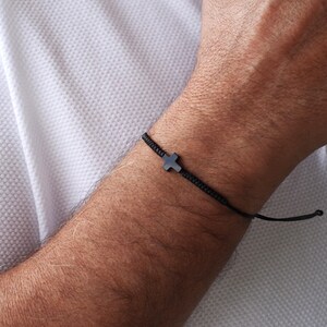 Black Cross Bracelet, Waterproof Cord Bracelet, Adjustable Black String Bracelet, Handmade Minimalist Jewelry, Gift for Him or Her | Handmade in Greece | Black cross charm