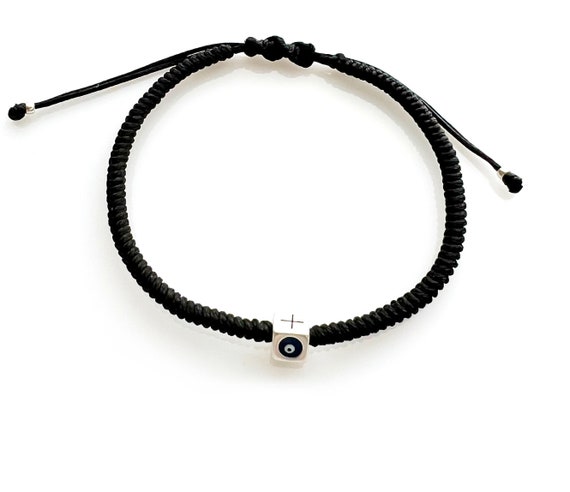 little dolphin evil eye on macrame cord little dolphin evil eye on macrame cord