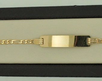 May include: A gold chain bracelet with a rectangular tag charm. The chain is a curb style with a polished finish.