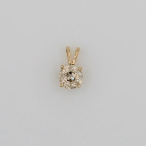 Antique 1920s Handmade Solid 14K Yellow Gold 1.24 Carats Old Miner Cut Diamond Pendant.