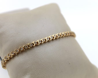 Vintage 1980s Handmade 14K Yellow Gold S Link Natural Diamond Tennis Bracelet.