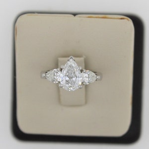 Vintage 1990s Handmade Platinum Diamond Engagement Ring. Three-Stone Pear Shaped Engagement Ring. GIA Certified Ring.