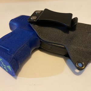 Kydex holster for Sig Sauer P365 and Armalaser TR27