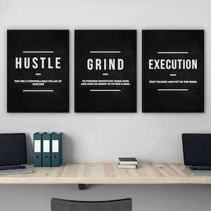 May include: Three black and white motivational posters with the words "Hustle", "Grind", and "Execution" in large white letters. Each poster has a definition of the word below it.