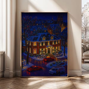 May include: A framed print of a winter night scene. A large brick house is decorated with Christmas lights and wreaths. Red cars and a white van are parked on the snow-covered street. The sky is dark blue with a church in the background.
