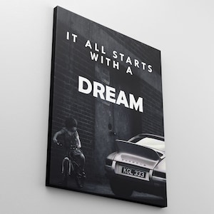 May include: Black and white photo of a child on a bicycle in front of a brick wall with the text "It all starts with a dream" and a silver Porsche with the license plate "KGL 333".