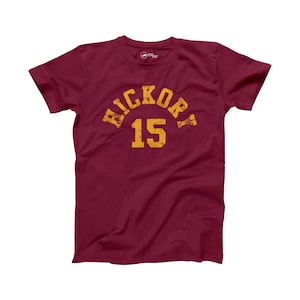 May include: Burgundy t-shirt with a yellow vintage-style graphic that says "HICKORY 15".