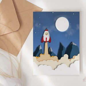 Carte fusée Off to the Moon, carte de joyeux anniversaire, carte d'anniversaire d'enfants de l'espace, intérieur vierge, carte d'enfants de fusée, carte d'anniversaire personnalisée