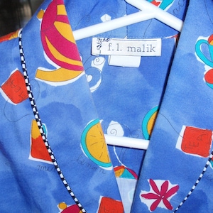 F.L.Malik Blue, Tea pots & Fruit,  Blouse - Skirt set. Smoke Free and Pet Free home