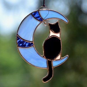 Stained glass cat on moon window hanging