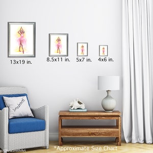 May include: Watercolor art prints of a ballerina in a pink tutu, displayed in various sizes: 13x19 in., 8.5x11 in., 5x7 in., and 4x6 in. The artwork is framed and hung on a white wall. The image includes a white wicker chair with a blue cushion and a wooden side table. The text reads "Approximate Size Chart".