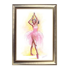 May include: Watercolor painting of a ballerina in a pink tutu and pointe shoes, framed in a gold-toned frame. The ballerina is wearing a crown and is posed with arms raised. The background is a soft yellow and white.