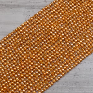 Süsswasserperle 3-3,5 mm Potato Dyed Burnt Orange, kleine Perlen