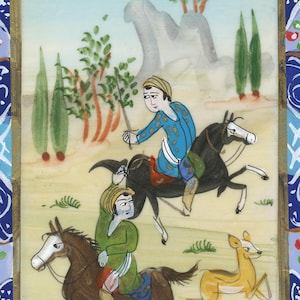 May include: An antique miniature painting depicting two figures on horseback, one in blue and the other in green, with a deer running alongside. The background features trees, a mountain, and a light blue sky. The painting is framed with gold and blue decorative borders.