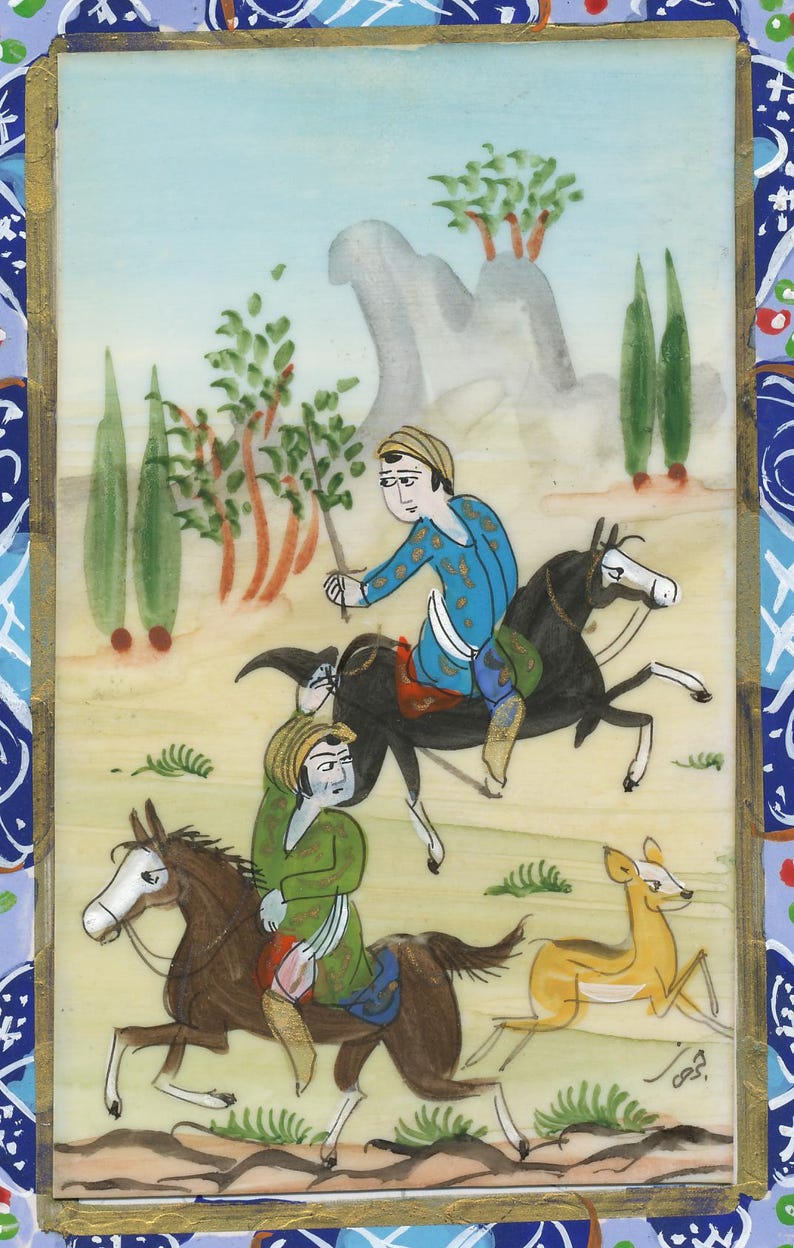 May include: An antique miniature painting depicting two figures on horseback, one in blue and the other in green, with a deer running alongside. The background features trees, a mountain, and a light blue sky. The painting is framed with gold and blue decorative borders.