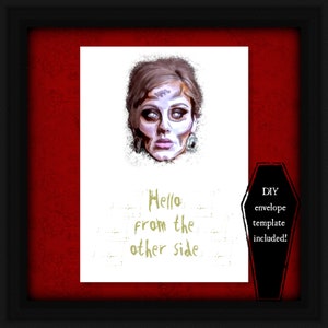 May include: A framed print featuring a stylized portrait of a woman with pale skin and dark eye sockets. The text "Hello from the other side" is written in a faded gold color. A black coffin-shaped graphic on the right side says "DIY envelope template included!"