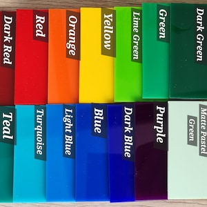 May include: A collection of rectangular acrylic swatches in various colors, each labeled with its corresponding name: Dark Red, Red, Orange, Yellow, Lime Green, Green, Dark Green, Teal, Turquoise, Light Blue, Blue, Dark Blue, Purple, and Matte Pastel Green.