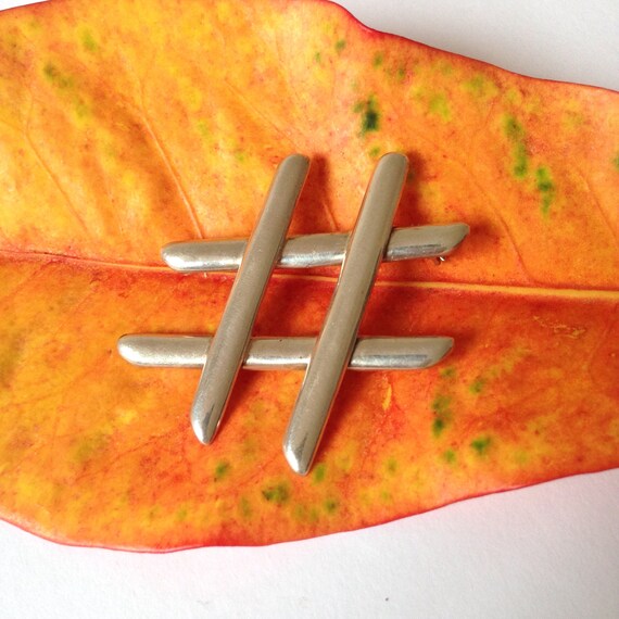 Minimalist sterling Taxco brooch