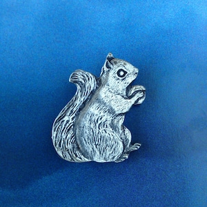 Cute vintage pewter squirrel brooch