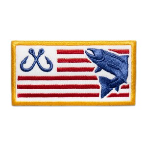 May include: An embroidered patch with a red, white, and blue American flag design. A blue fish jumps out of the water with two fishing hooks above the flag.