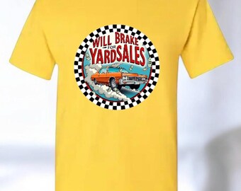 May include: Yellow t-shirt with a black and white checkered circle graphic. The graphic features a cartoon orange car with the text "Will Brake for Yardsales".