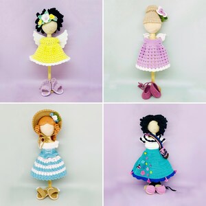 May include: Four crocheted dolls with different outfits and hairstyles. Each doll is wearing a different dress and has a different hairstyle. The dolls are all standing on a white background.