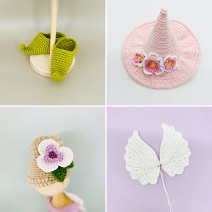 May include: A set of crocheted items including a pink witch hat with white flowers, a pair of green elf shoes, a white crocheted angel wing set, and a pink and white crocheted flower hat.