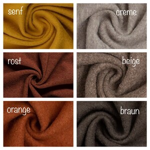 Puede incluir: Seis muestras de tela en diferentes colores: amarillo mostaza, gris claro, marr&oacute;n rojizo, beige, naranja y gris oscuro. Las muestras est&aacute;n etiquetadas con las siguientes palabras: senf, crema, rost, beige, naranja y braun.