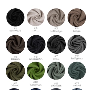 Puede incluir: Una carta de colores que muestra 16 colores de tela diferentes, etiquetados con n&uacute;meros y nombres alemanes. Los colores incluyen negro, beige, marr&oacute;n, gris, verde, azul y blanco.