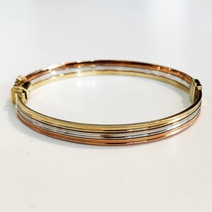 10k solid rose, yellow& white gold rare find fashion statement hinged stackable triple circle smooth finishing thick solid gold bangle