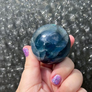 Blue fluorite sphere: fluorite crystal ball with rainbows 45mm