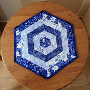Hexagon Christmas Table Topper, Blue Cotton Quilted Centerpiece (22")