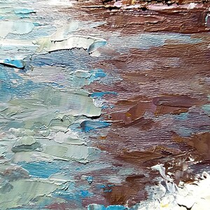 May include: Abstract painting with thick brushstrokes in shades of blue, brown, and white. The painting has a textured surface and a horizontal orientation.