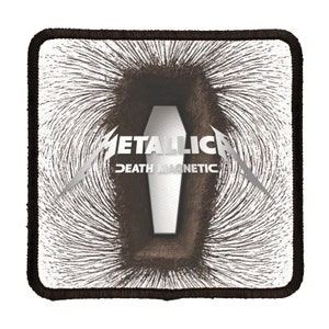 May include: A white square patch with a black border. The patch features a black and white image of a coffin with a magnetic field around it. The text "Metallica" and "Death Magnetic" are printed in white on the patch.