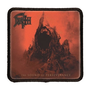 May include: A black and white patch featuring the band name "DEATH" in a gothic font. The background is a red-orange colour with a shadowy figure of a hooded figure with an open mouth. The text "THE SOUND OF PERSEVERANCE" is at the bottom of the patch.