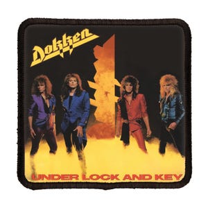 May include: A black and yellow square patch with the band name "Dokken" in white letters and the album title "Under Lock and Key" in red letters. The band members are pictured in front of a fiery background.